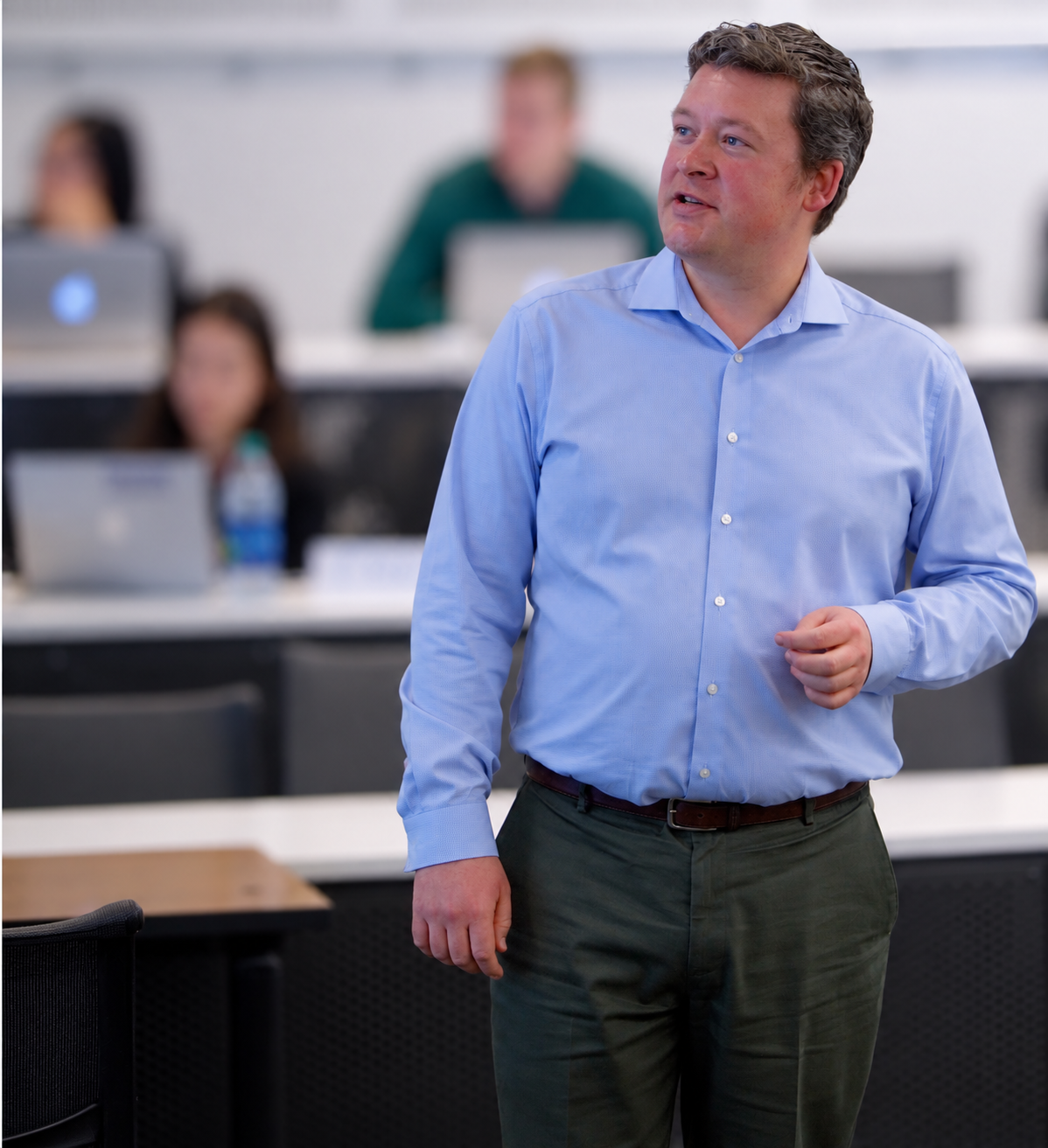 Asher Curtis teaching in a Foster School of Business classroom